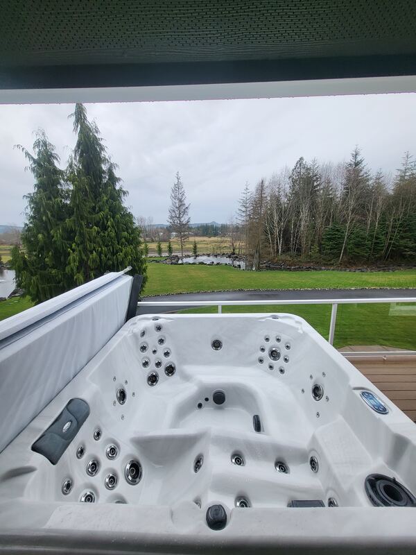 Same hot tub with clean marbled water after refill