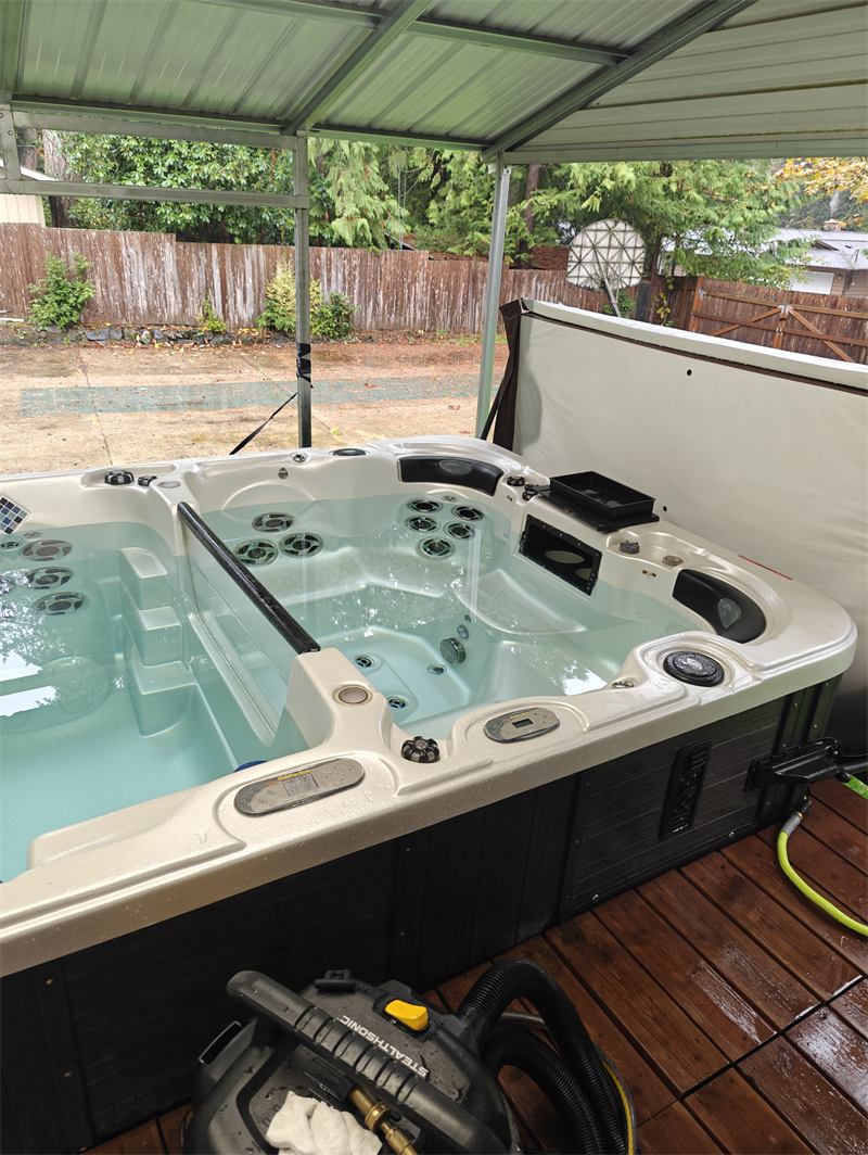 Same hot tub refilled with clean clear water after service