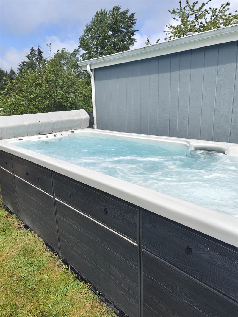 Swim spa with clean churning aqua water