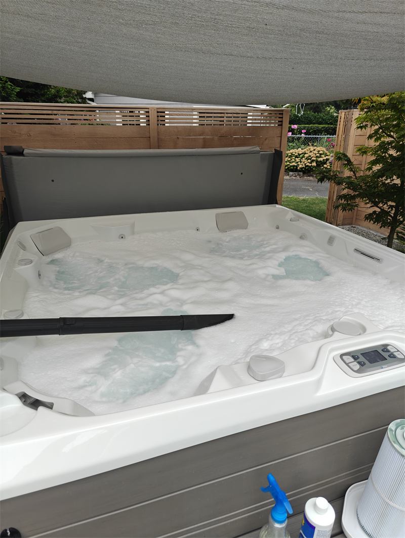 Hot tub full of thick white foam during a jet-line purge